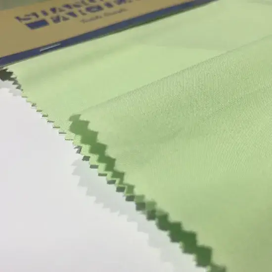 Vải bảo vệ trơn 65% Poly/ 35% Rayon nhuộm màu vàng, phục vụ cho đồng phục, trang phục, ga gối... với độ rộng 150cm và trọng lượng 125GSM hình ảnh 1-description